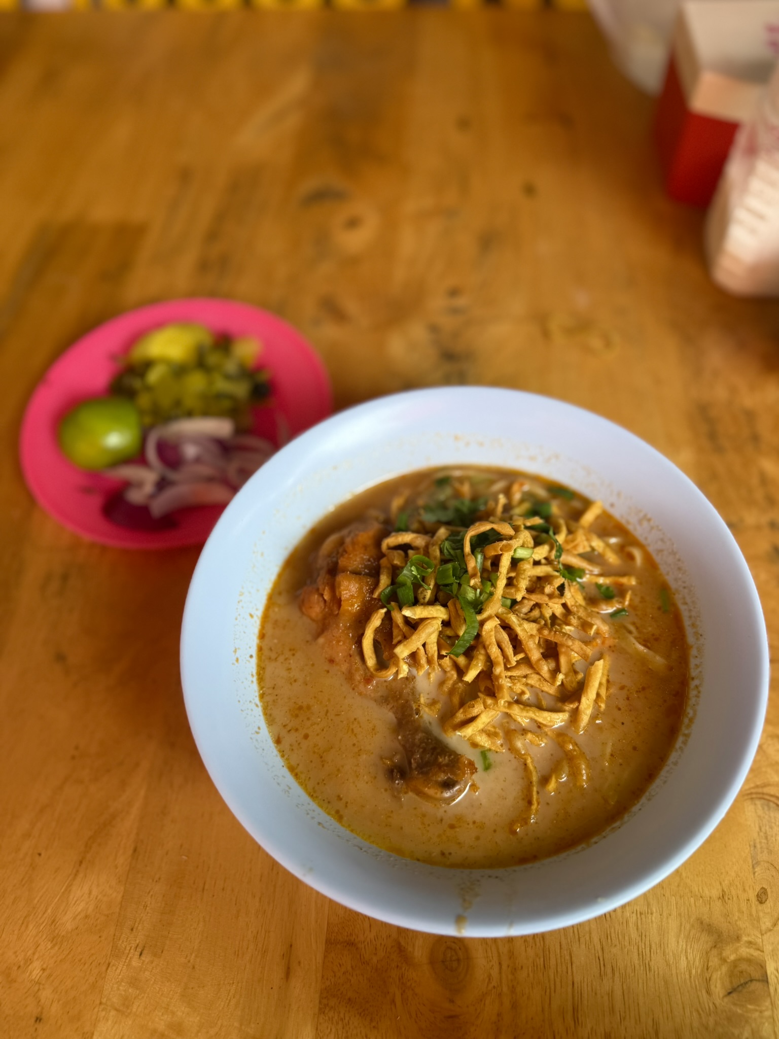 Khao Soi at Lung Prakit Kad Kom with condiments