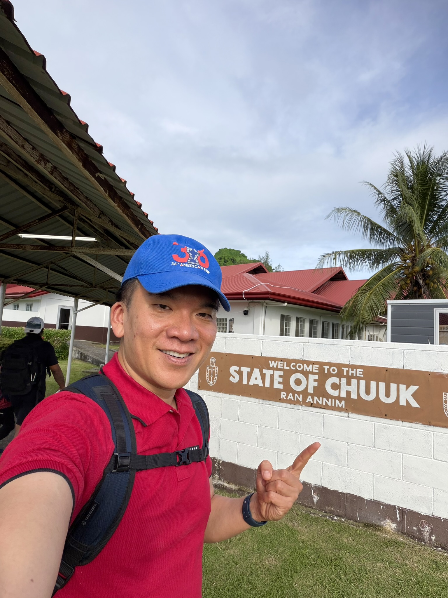 Andrew at Welcome to State of Chuuk sign