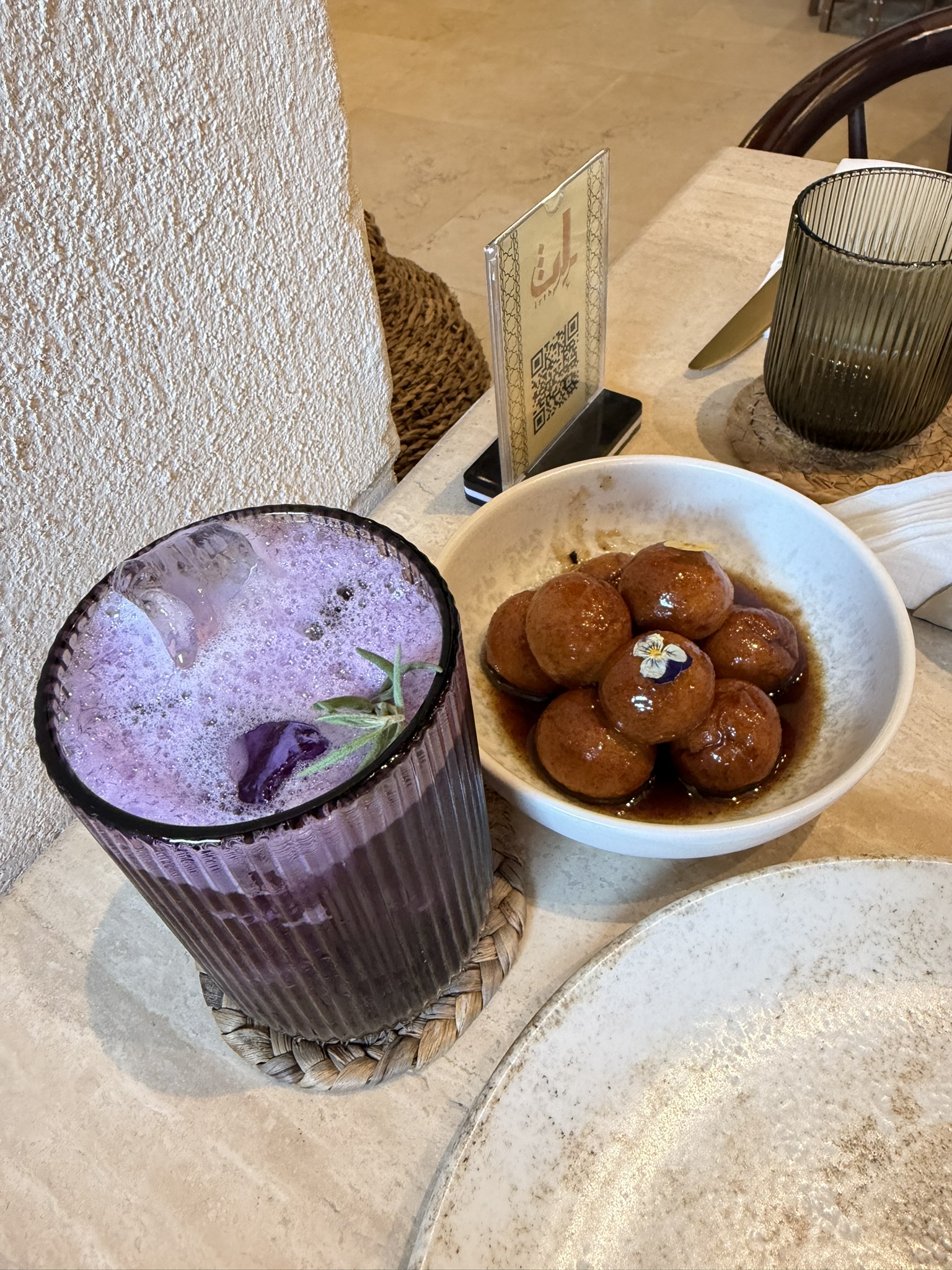 Butterfly pea lemonade and luqaimat at Irth Boutique and Cafe