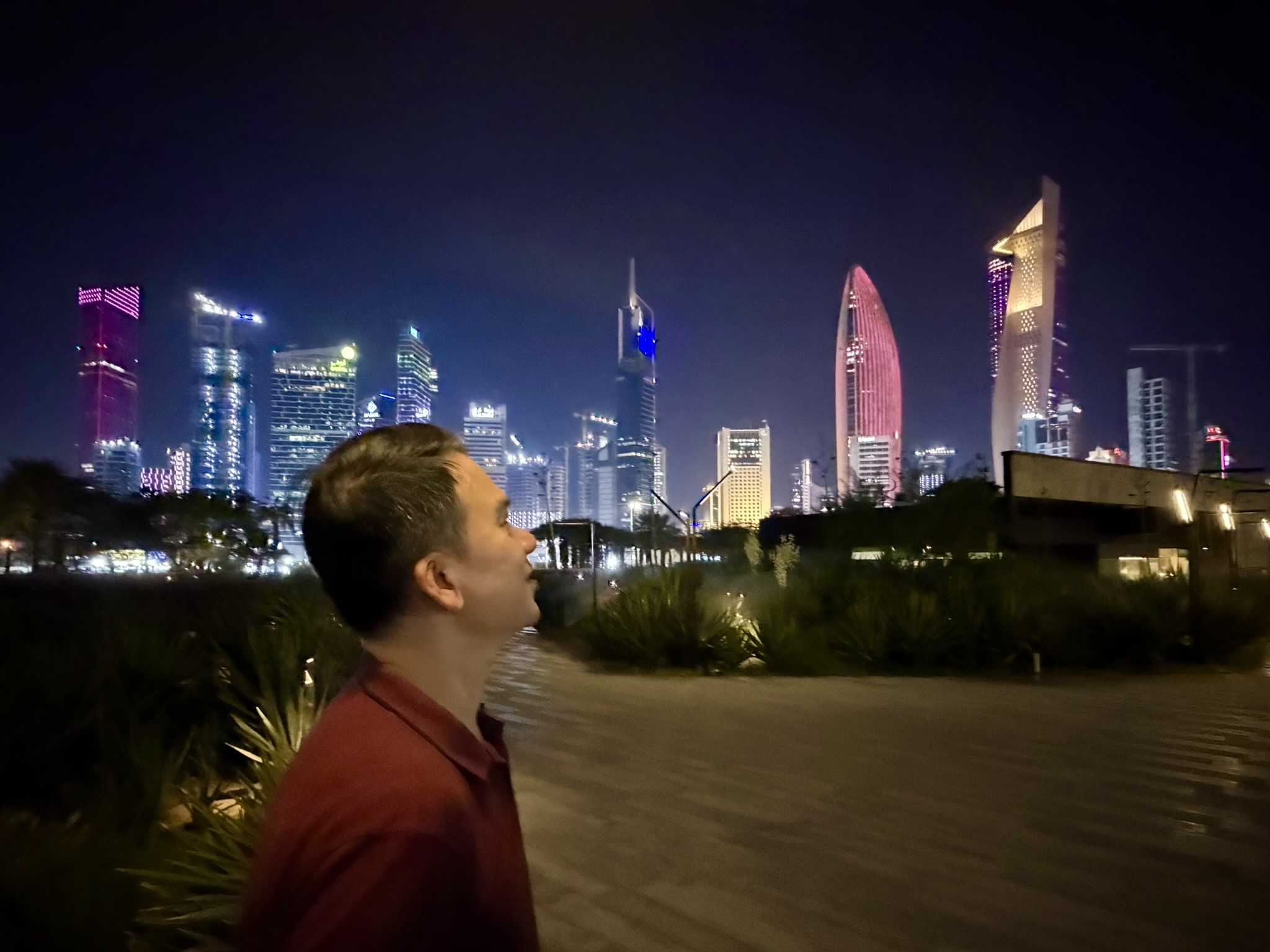 Gazing at the glowing Kuwait City skyline from Al Shaheed Park at night