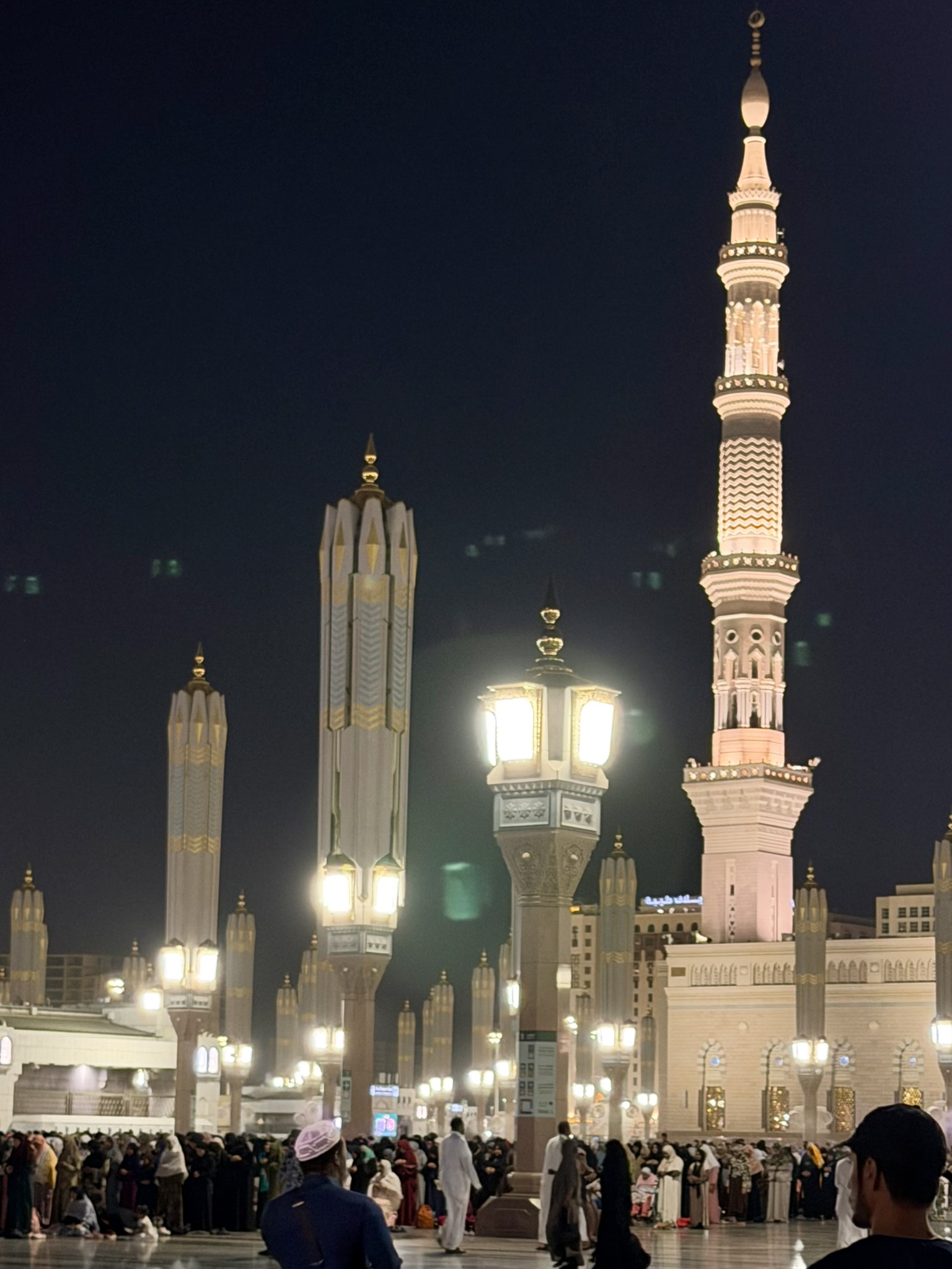 Prophet's Mosque minarets at night