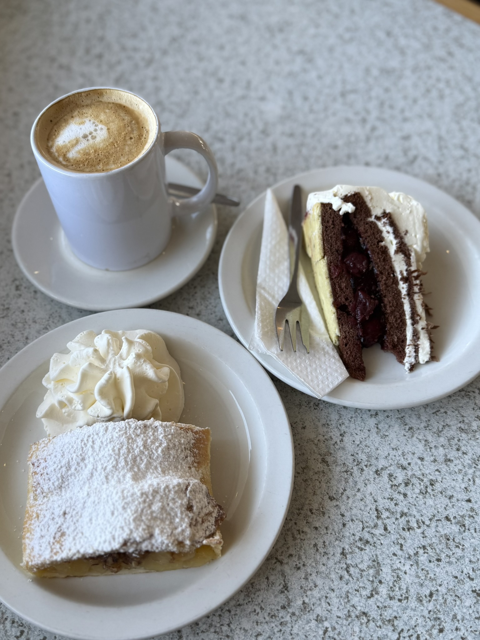 German pastries - apple strudel and Black Forest cake with coffee in Swakopmund