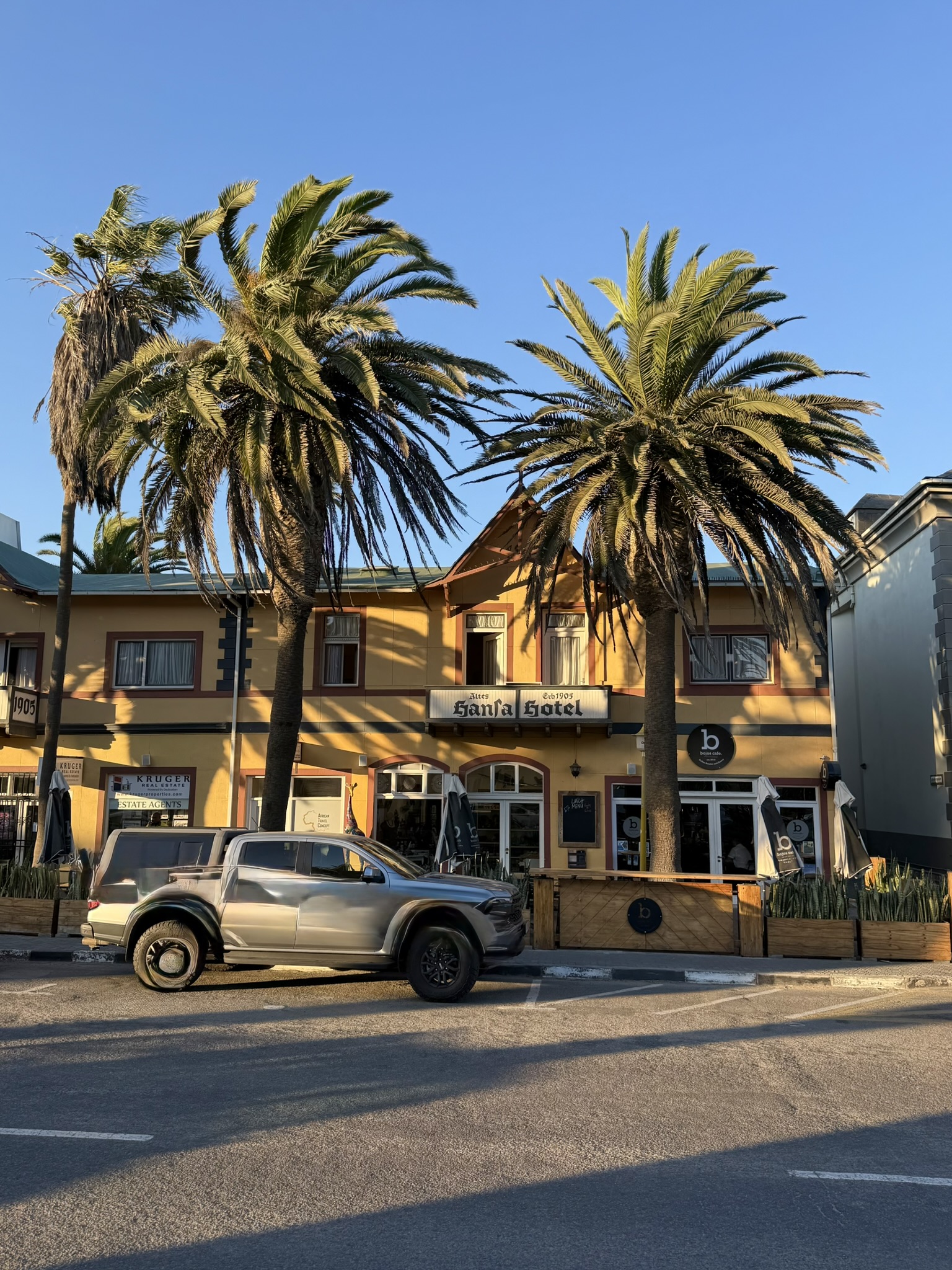 Hansa Hotel with palm trees in Swakopmund