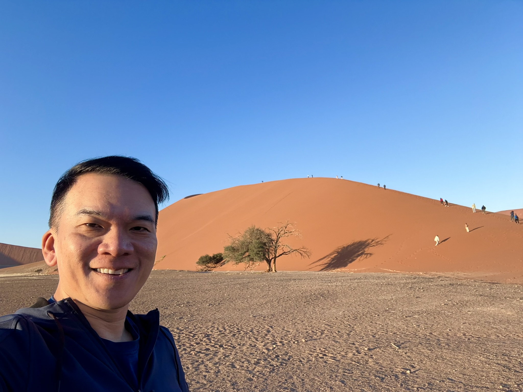 Selfie in front of red dunes at Sossusvlei