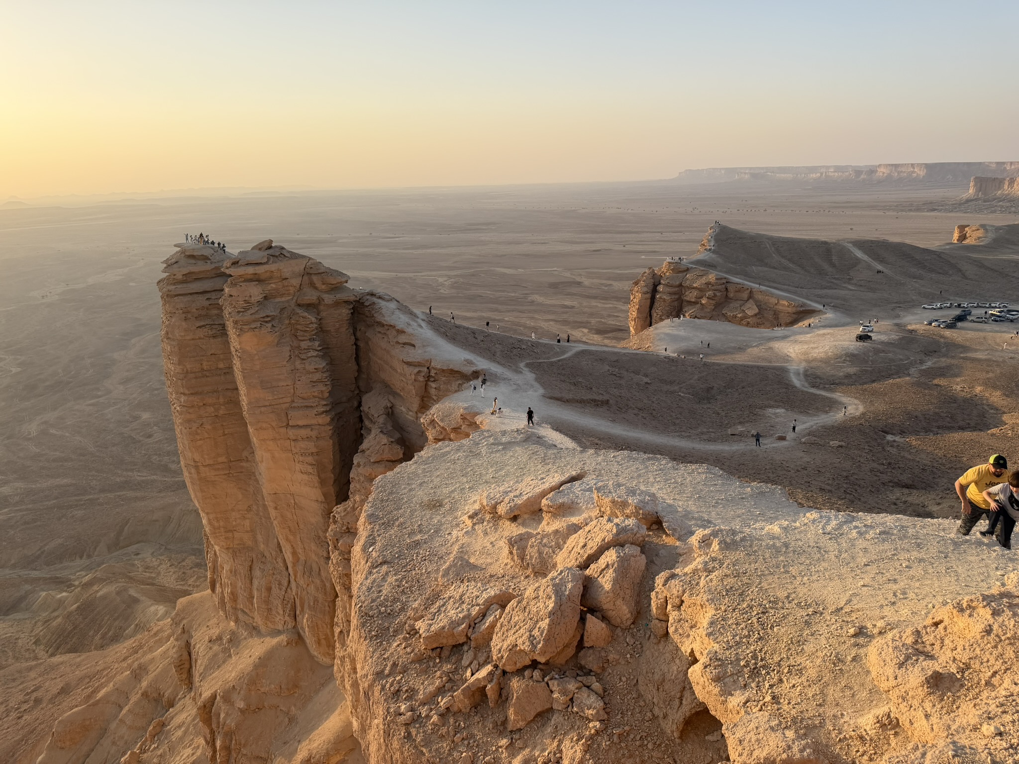 Wide shot of Edge of the World cliffs at sunset