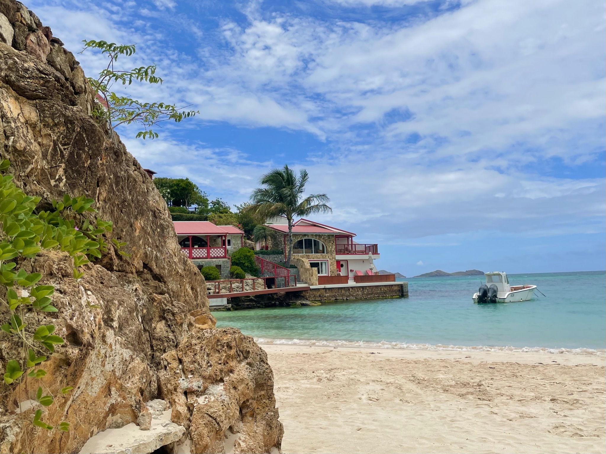 Rocky coastline with waterfront hotel